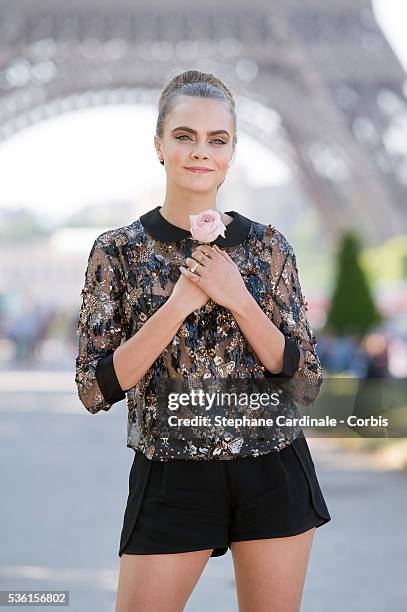 Cara Delevingne attends the photocall of the movie 'Paper Towns' on the Champs De Mars on June 17, 2015 in Paris, France.