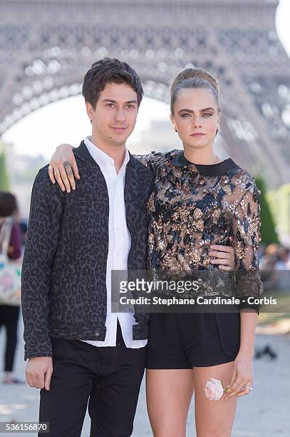 Nat Wolff and Cara Delevingne attend the photocall of the movie 'Paper Towns' on the Champs De Mars on June 17, 2015 in Paris, France.