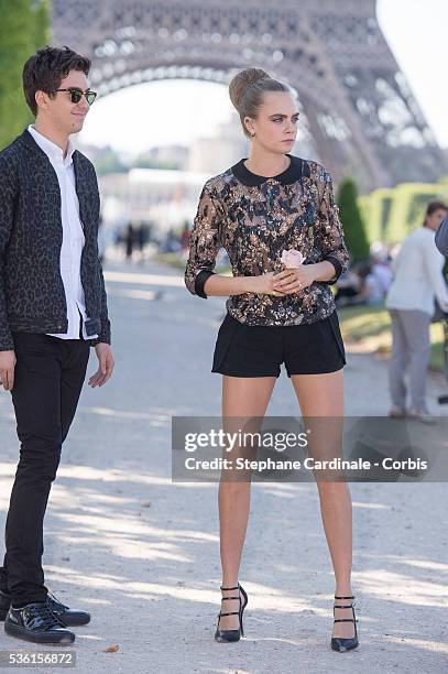 Nat Wolff and Cara Delevingne attend the photocall of the movie 'Paper Towns' on the Champs De Mars on June 17, 2015 in Paris, France.