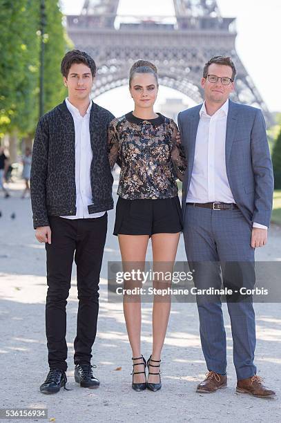 Nat Wolff, Cara Delevingne and John Green attend the photocall of the movie 'Paper Towns' on the Champs De Mars on June 17, 2015 in Paris, France.
