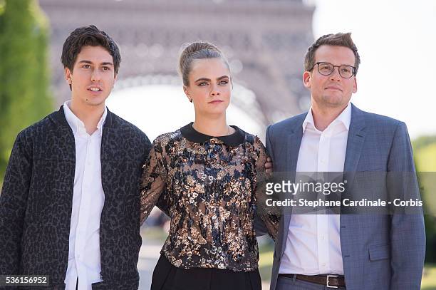 Nat Wolff, Cara Delevingne and John Green attend the photocall of the movie 'Paper Towns' on the Champs De Mars on June 17, 2015 in Paris, France.
