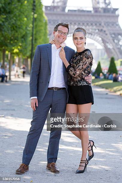 John Green and Cara Delevingne attend the photocall of the movie 'Paper Towns' on the Champs De Mars on June 17, 2015 in Paris, France.