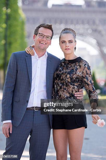 John Green and Cara Delevingne attend the photocall of the movie 'Paper Towns' on the Champs De Mars on June 17, 2015 in Paris, France.