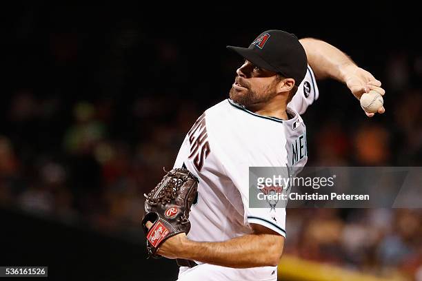 Relief pitcher Josh Collmenter of the Arizona Diamondbacks pitches against the San Diego Padres during the sixth inning of the MLB game at Chase...