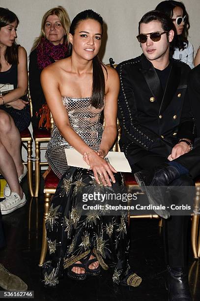 Actress Michelle Rodriguez and Peter Brant attend the Jean Paul Gaultier show as part of Paris Fashion Week Haute Couture Fall/Winter 2015/2016 on...