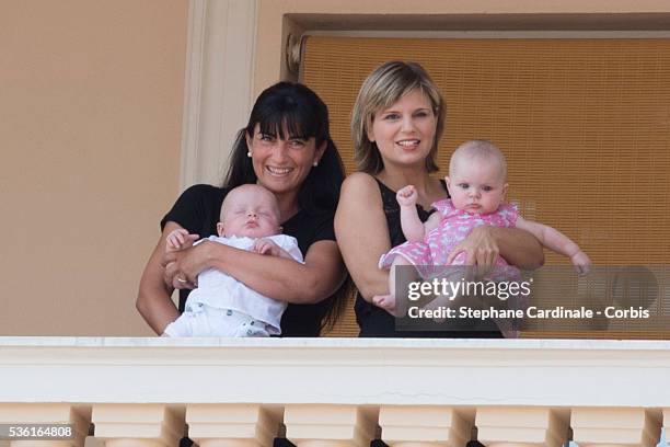 Prince Jacques of Monaco and Princess Gabriella of Monaco appear at the Palace balcony during the First Day of the 10th Anniversary on the Throne...