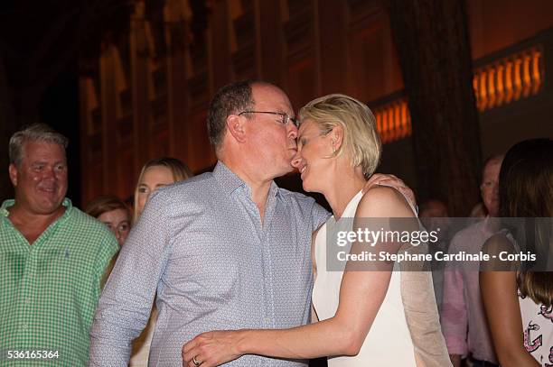 Prince Albert II of Monaco and Princess Charlene of Monaco attends the Robbie Williams concert during the Second Day of the 10th Anniversary on the...