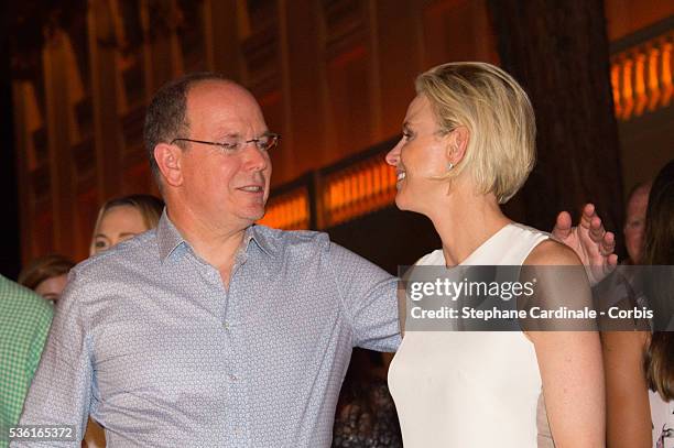 Prince Albert II of Monaco and Princess Charlene of Monaco attends the Robbie Williams concert during the Second Day of the 10th Anniversary on the...