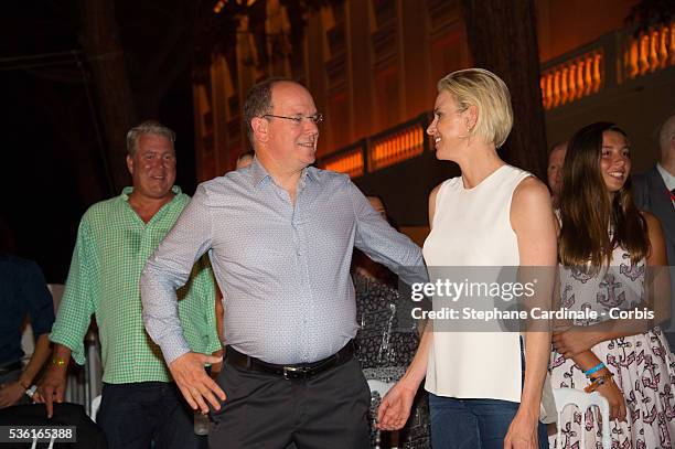 Prince Albert II of Monaco and Princess Charlene of Monaco attends the Robbie Williams concert during the Second Day of the 10th Anniversary on the...