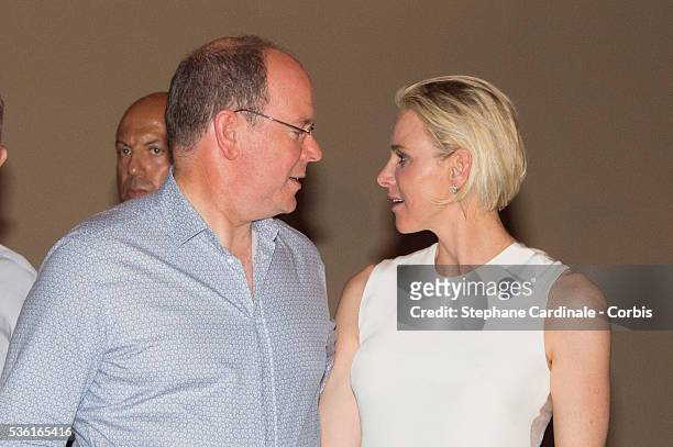 Prince Albert II of Monaco and Princess Charlene of Monaco attends the Robbie Williams concert during the Second Day of the 10th Anniversary on the...