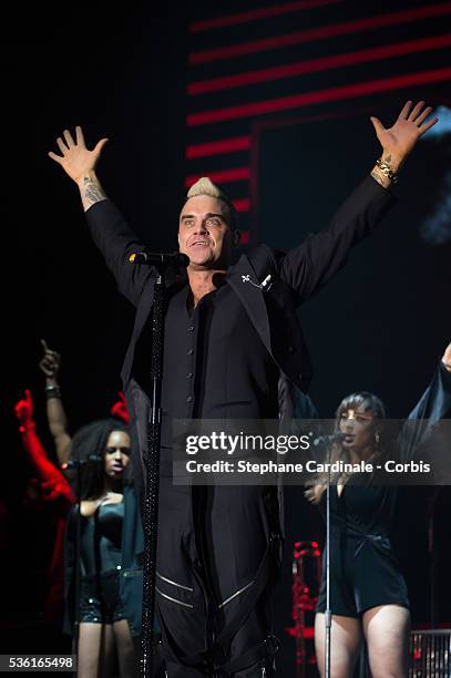 Robbie Williams performs onstage during the Second Day of the 10th Anniversary on the Throne Celebrations on July 12, 2015 in Monaco, Monaco.