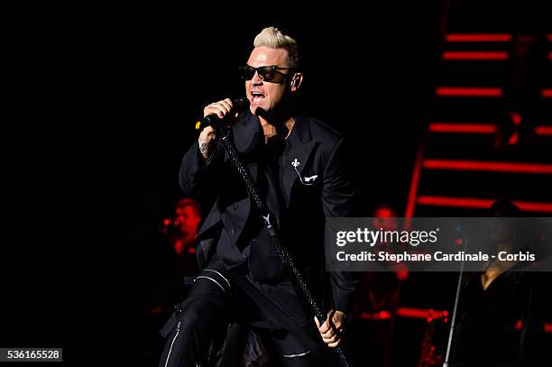 Robbie Williams performs onstage during the Second Day of the 10th Anniversary on the Throne Celebrations on July 12, 2015 in Monaco, Monaco.