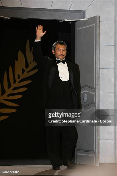 Director and jury member Tsui Hark arrives for the final adjudication at 57th Cannes Film Festival award ceremony.