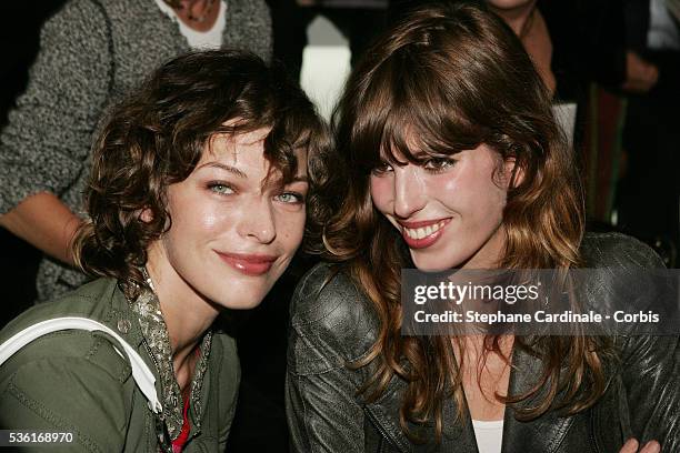 Actresses Milla Jovovich and Lou Doillon attend the Dior fashion show, Spring-Summer 2005 ready-to-wear collection, during the Paris Fashion Week.