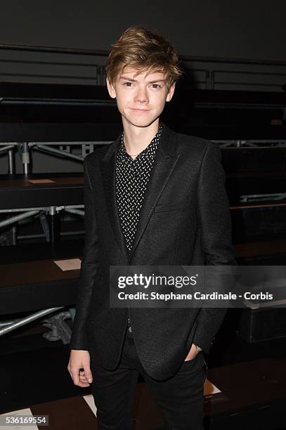 Thomas Brodie-Sangster attends the Saint Laurent show as part of the Paris Fashion Week Womenswear Spring/Summer 2016 on October 5, 2015 in Paris,...