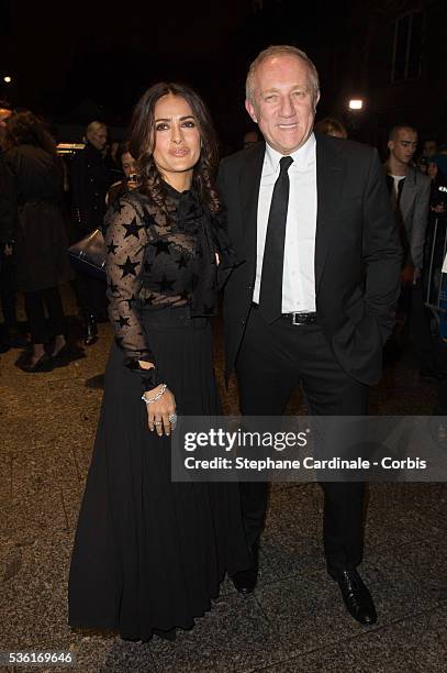 Salma Hayek and Francois-Henri Pinault attend the Saint Laurent show as part of the Paris Fashion Week Womenswear Spring/Summer 2016 on October 5,...