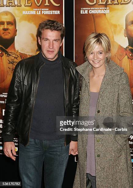 French TV hosts Benjamin Castaldi and Flavie Flament attend the premiere of the show "Gladiateur" directed by Elie Chouraqui at the Palais des Sports.