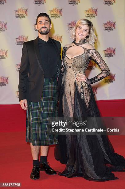 Florent Mothe and Camille Lou arrive at the 17th NRJ Music Awards at Palais des Festivals on November 7, 2015 in Cannes, France.