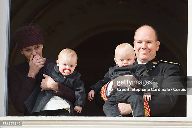 Princess Charlene of Monaco, Princess Gabriella of Monaco, Prince Albert II of Monaco and Prince Jacques of Monaco at the Balcony Palace during the...