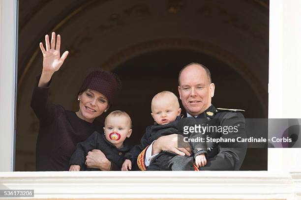 Princess Charlene of Monaco, Princess Gabriella of Monaco, Prince Albert II of Monaco and Prince Jacques of Monaco at the Balcony Palace during the...
