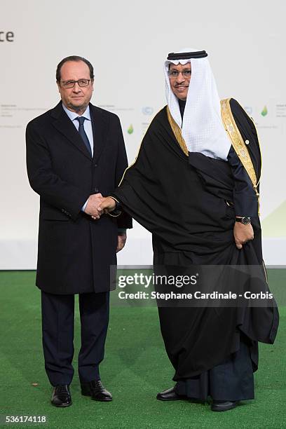 Kuwaiti Prime Minister Sheikh Jaber al-Mubarak al-Sabah is welcomed by French President Francois Hollande as he arrives for the COP21 United Nations...