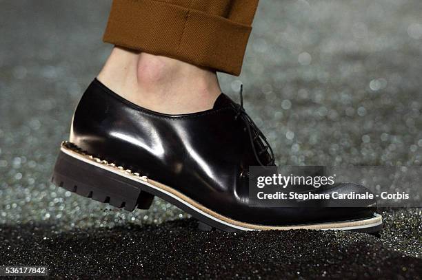 Shoes of a model is seen as he walks the runway during the Berluti Menswear Fall/Winter 2016-2017 show as part of Paris Fashion Week on January 22,...