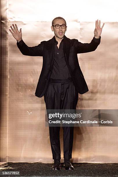 Designer Alessandro Sartori walks the runway during the Berluti Menswear Fall/Winter 2016-2017 show as part of Paris Fashion Week on January 22, 2016...