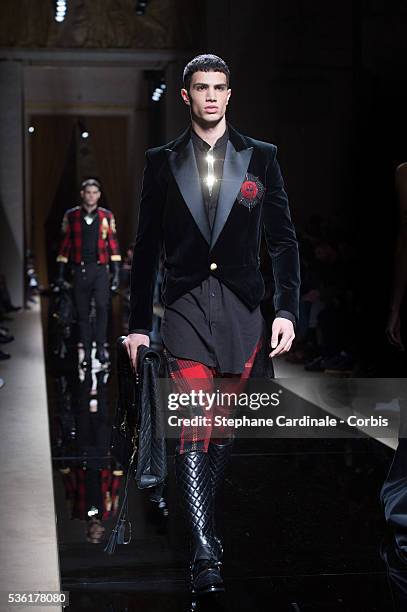 Model walks the runway during the Balmain Menswear Fall/Winter 2016-2017 show as part of Paris Fashion Week on January 23, 2016 in Paris, France.