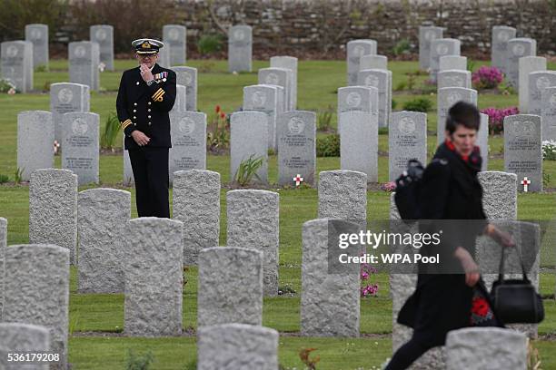 Guests look at graves after attending a service at Lyness Cemetery during the 100th anniversary commemorations for the Battle of Jutland on May 31,...