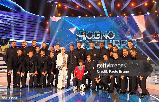 Tv presenter Antonella Clerici and Italy team pose during the 'Sogno Azzurro' TV programme at Auditorium del Foro Italico on May 31, 2016 in Rome,...