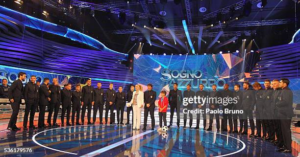 Tv presenter Antonella Clerici and Italy team pose during the 'Sogno Azzurro' TV programme at Auditorium del Foro Italico on May 31, 2016 in Rome,...