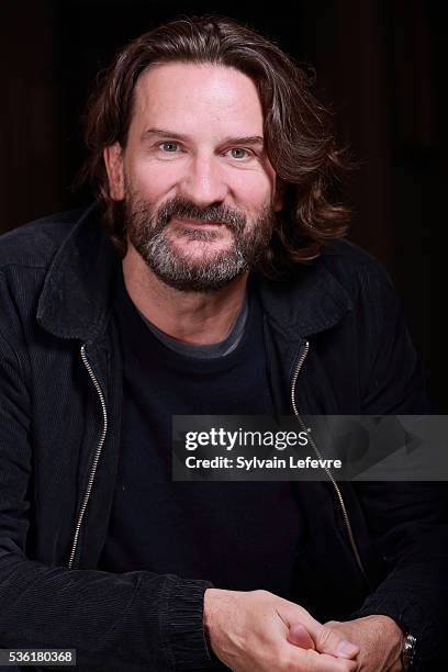 French writer and director Frederic Beigbeder poses before press conference for his last film "L'ideal" on May 31, 2016 in Lille, France.