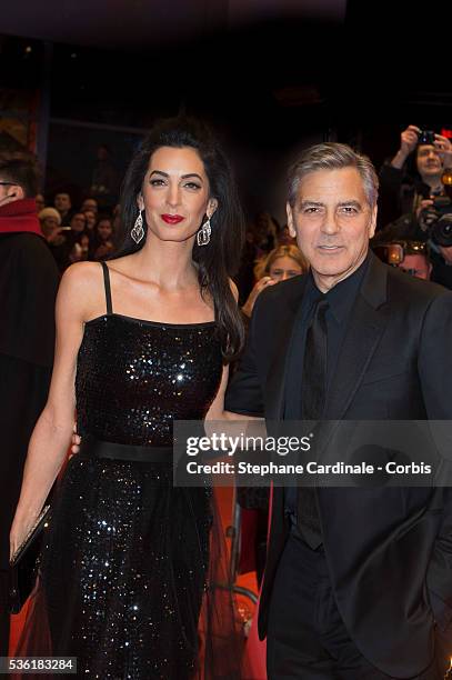 George Clooney and wife Amal Clooney attend the 'Hail, Caesar!' premiere during the 66th Berlinale International Film Festival at Berlinale Palace on...