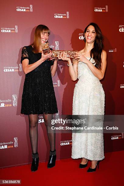 Alice Winocour and Deniz Gamze Erguven pose with their awards of Best Script and Best First Feature for the movie 'Mustang' during The Cesar Film...