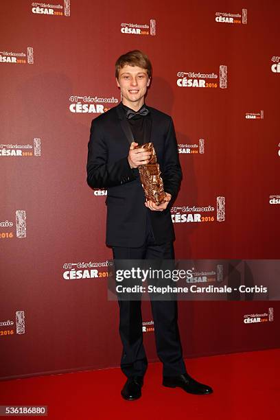 Actor Rod Paradot poses with his award of Best Male Newcomer for the movie 'La Tete Haute' during The Cesar Film Awards 2016 at Theatre du Chatelet...