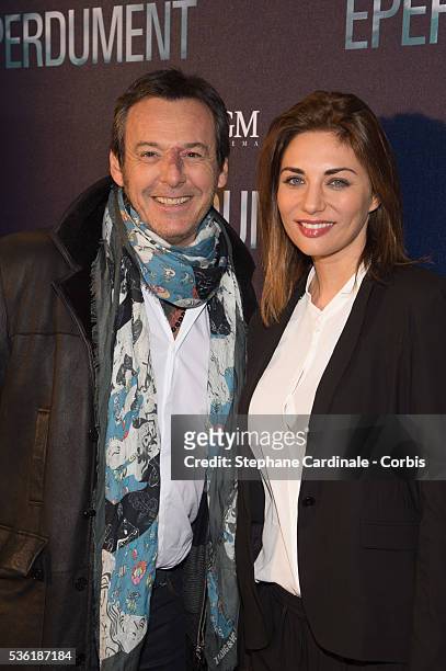Jean-Luc Reichmann and Ariane Brodier attend the Premiere of 'Eperdument' at UGCNormandie on February 29, 2016 in Paris, France.