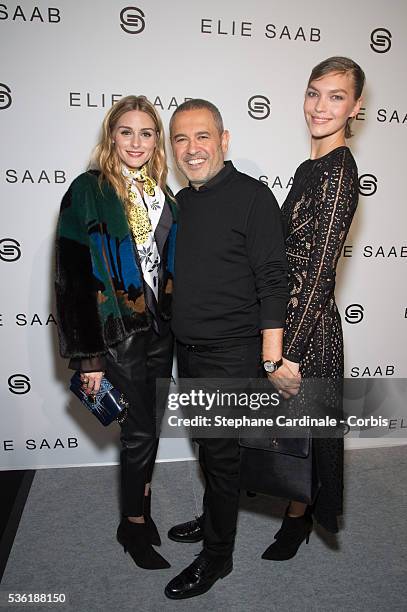 Olivia Palermo, Designer Elie Saab and Arizona Muse pose backstage after the Elie Saab show as part of the Paris Fashion Week Womenswear Fall/Winter...