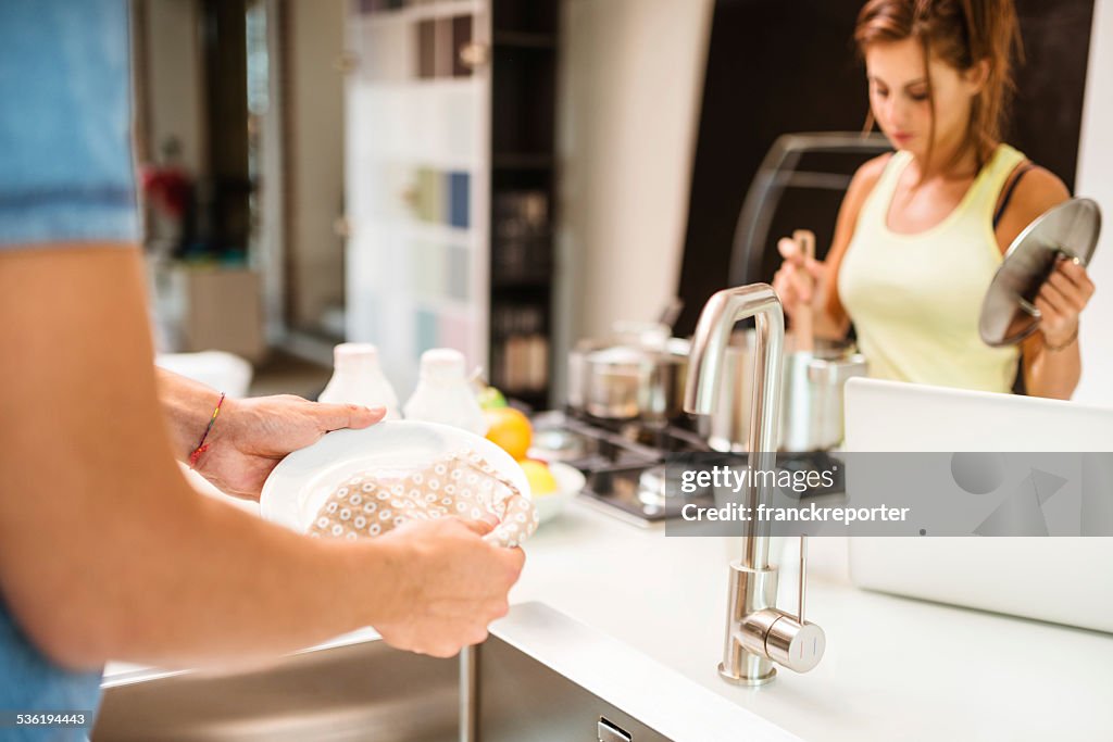 Washing the dishes on the kitchen