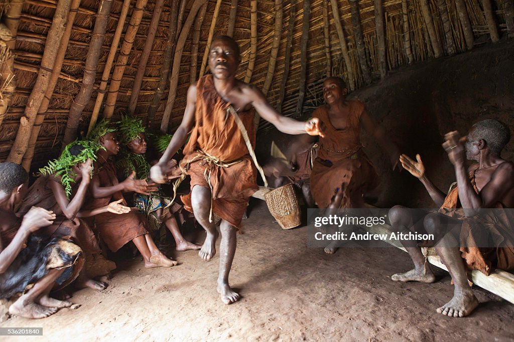 Red Batwa Batwa members act out a story with music song and dance in the... News ...
