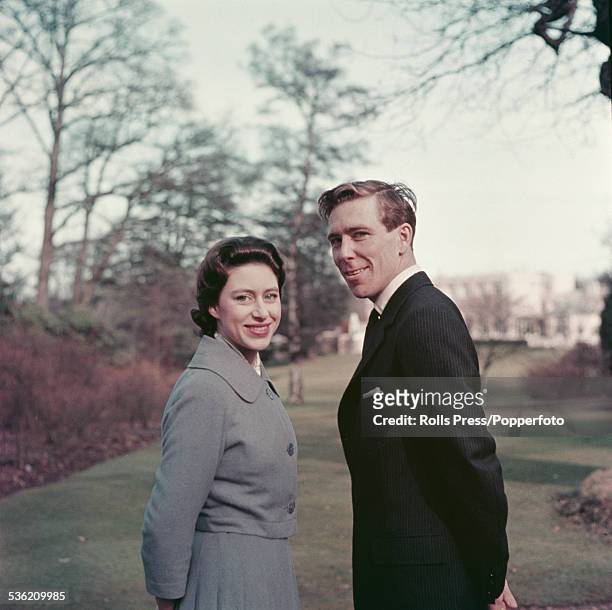 Princess Margaret and fiance Antony Armstrong-Jones pictured standing in the grounds of the Royal Lodge, Windsor after announcing their engagement on...