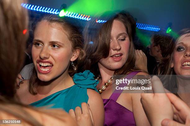 Students from Whitley Bay High School, Newcastle, celebrate before leaving for their high school prom, following graduation from A levels. In recent...