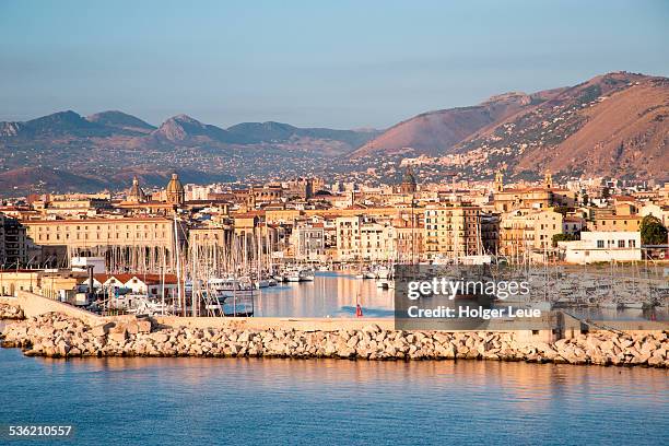 breakwater, marina, city and mountains - palermo sicily stock pictures, royalty-free photos & images