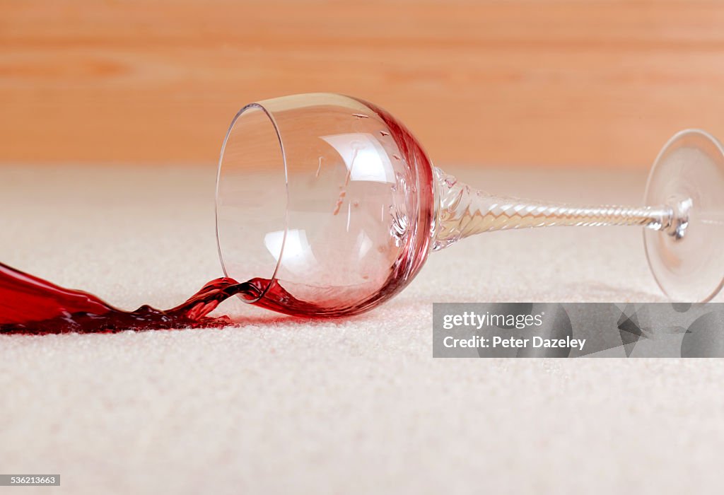 Red wine accident spill on carpet