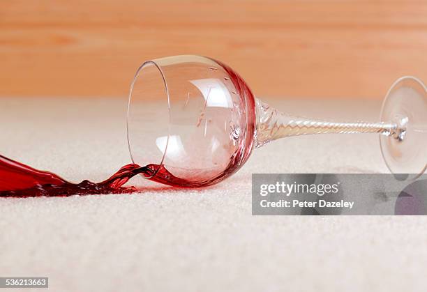 red wine accident spill on carpet - damaged carpet stock pictures, royalty-free photos & images