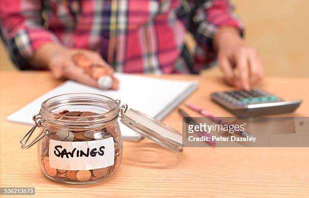 teenager counting savings - bureau de change stockfoto's en -beelden