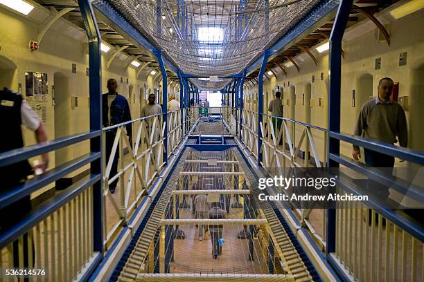 View along wing A of Wandsworth prison. This wing has the suicide netting between each floor. HMP Wandsworth in South West London was built in 1851...