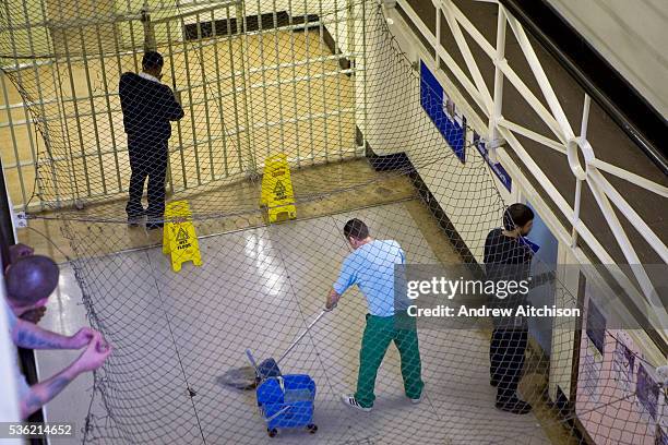 Prisoner on cleaning duties. HMP Wandsworth, London, United Kingdom.