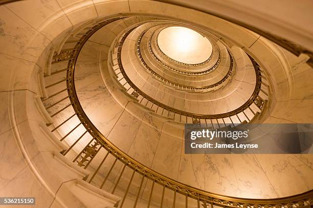 Interior freestanding spiral staircase inside the United States Supreme Court building in Washington DC
