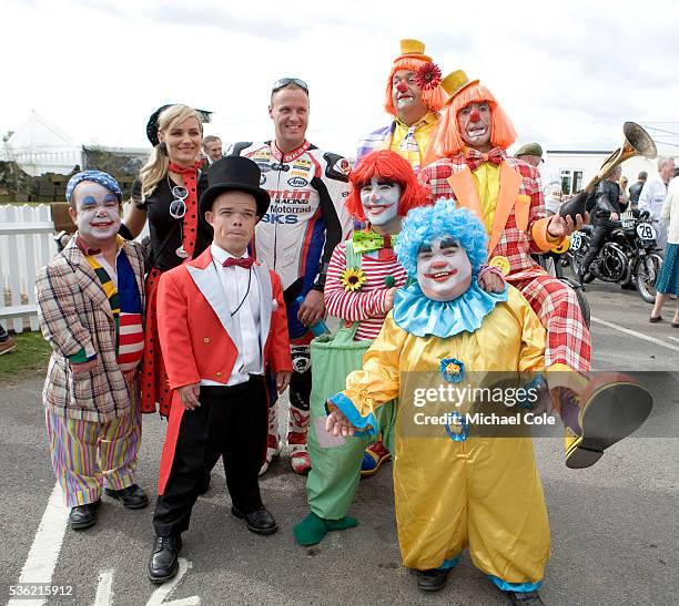 Dwarfs with clowns and bike rider & lady