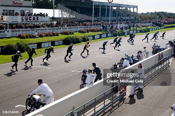 Riders running for their bikes at the start of the Barry Sheene Memorial Trophy